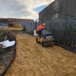Ride on road roller in use